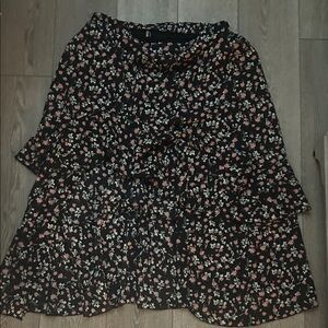 Floral Black Skirt with front slit and built-in shorts.